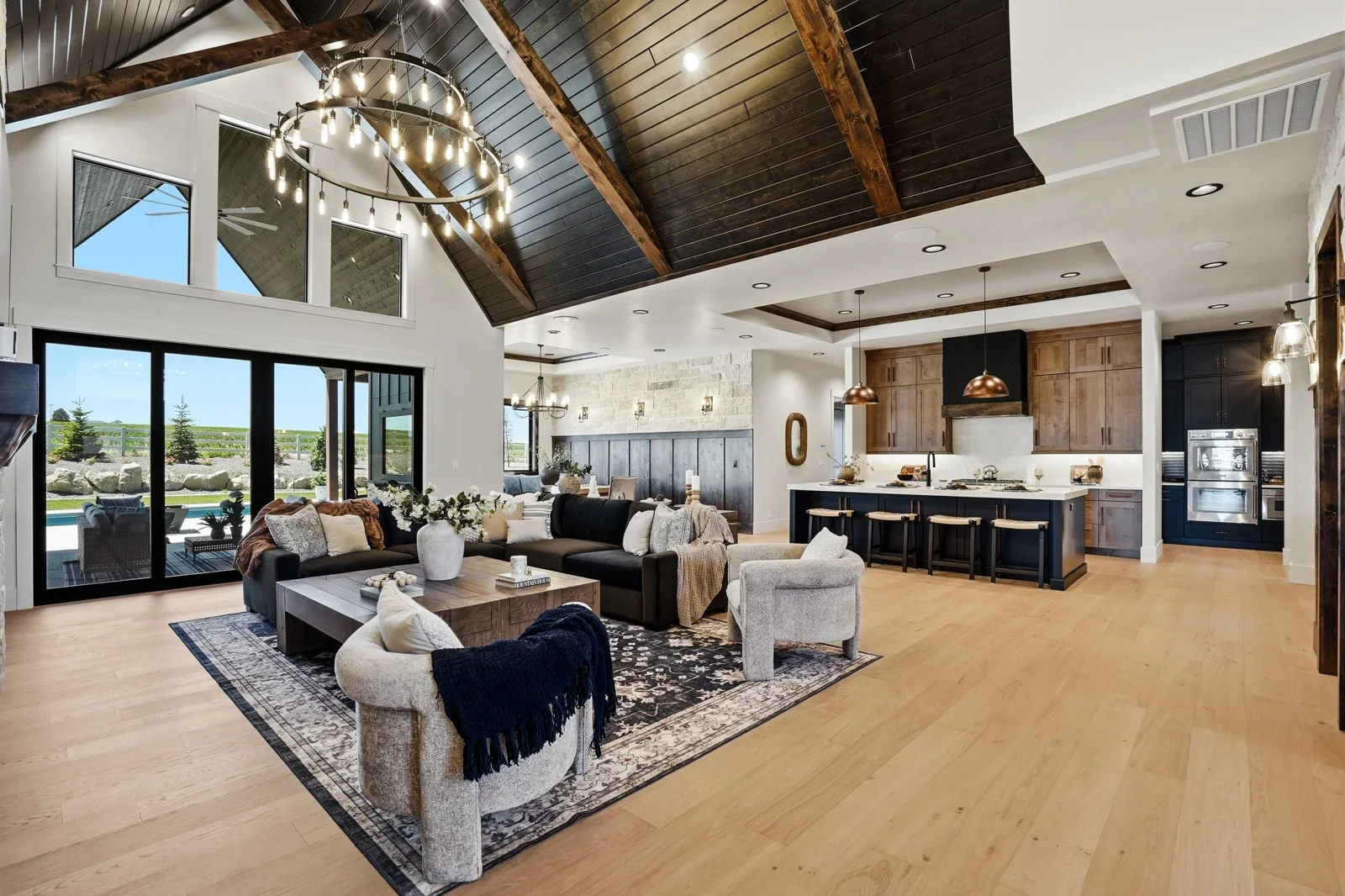 Cody great room opening onto the kitchen and dining area